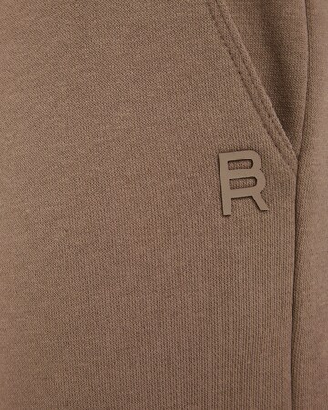 WE Fashion Tapered Trousers in Brown