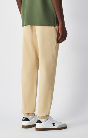 Champion Authentic Athletic Apparel Tapered Pants in Beige
