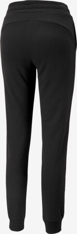 PUMA - Tapered Pantalón deportivo en negro