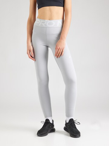 NIKE Skinny Sportsbukser i grå: forside