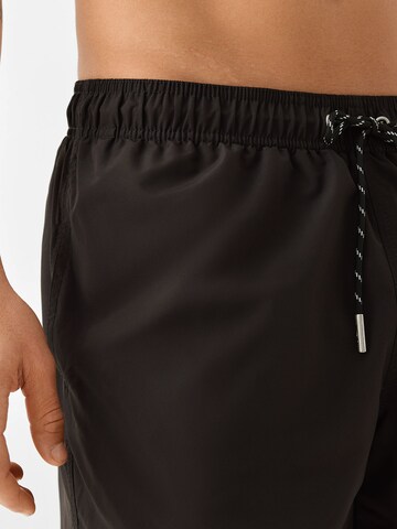 Bershka Badshorts i svart