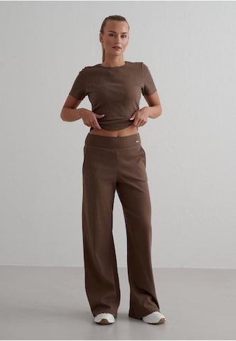 Loosefit Pantaloni sportivi 'Ease' di Aim'n in marrone