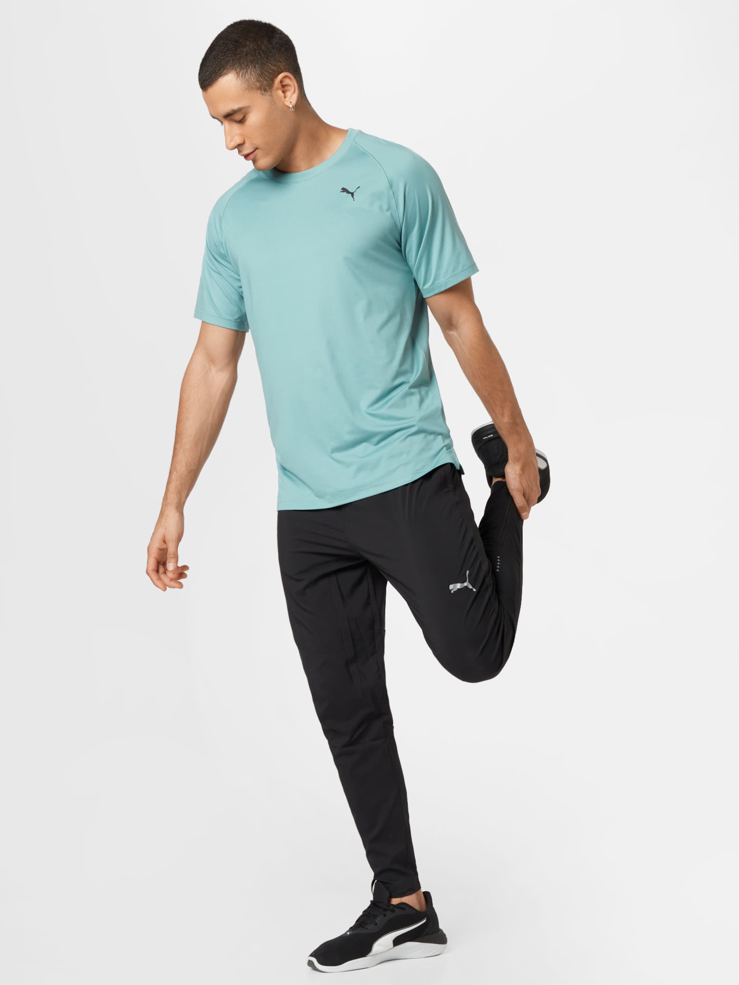 PUMA Performance Shirt in Blue | ABOUT YOU