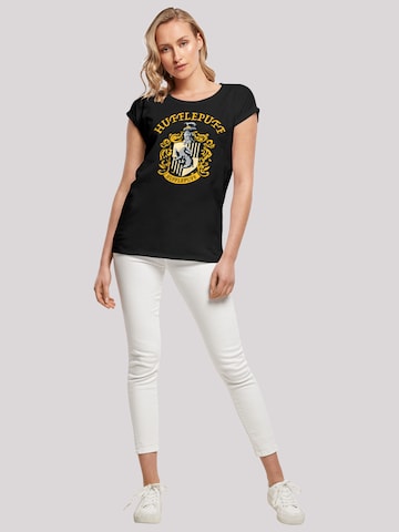 F4NT4STIC T-Shirt 'Harry Potter Hufflepuff Crest' in Schwarz