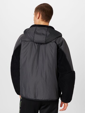 PUMA Between-Season Jacket in Black