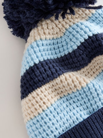 Next - Gorra 'Dinosaur Spike' en azul