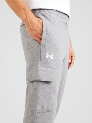 UNDER ARMOUR Tapered Παντελόνι φόρμας 'Rival' σε γκρι