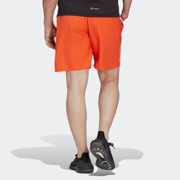 ADIDAS SPORTSWEAR Regular Workout Pants 'Own the Run' in Orange