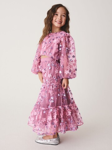 Set Next en rose