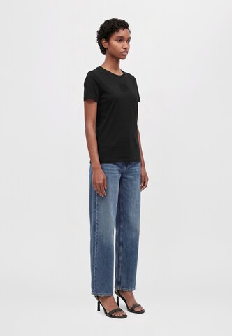 ARMANI EXCHANGE - Camiseta en negro: lado