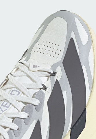 Chaussure de course 'Adizero Evo SL Exo' ADIDAS PERFORMANCE en blanc