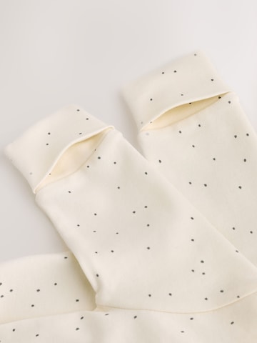 Pigiama di Next in beige