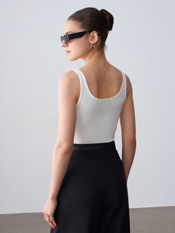 Haut Dilvin en blanc