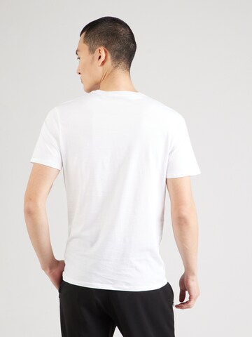 GUESS Bluser & t-shirts i hvid