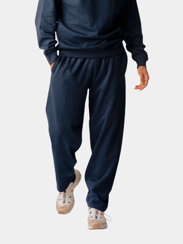 TEESHOPPEN Tapered Pants in Blue: front