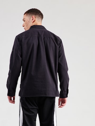 JACK & JONES - Chaqueta de entretiempo 'JCOGRID CLASSIC' en negro