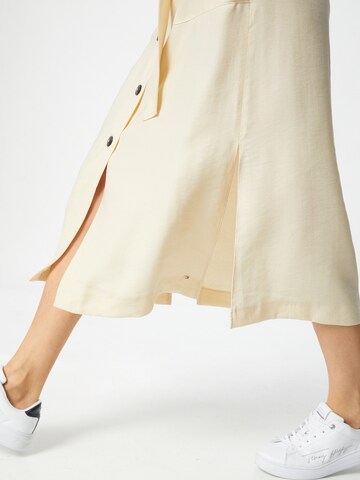 TOMMY HILFIGER Rock 'TOMMY HILFIGER X ABOUT YOU BUTTONED MIDI SKIRT' in Beige