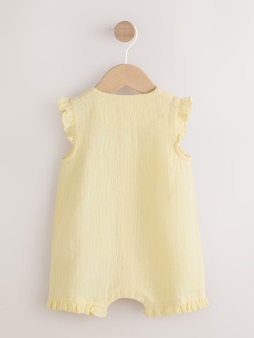 Salopetă de la Next pe galben