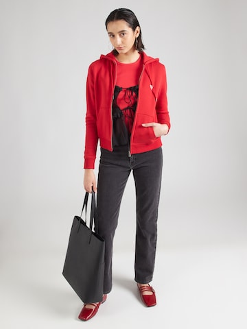 Veste de survêtement GUESS JEANS en rouge