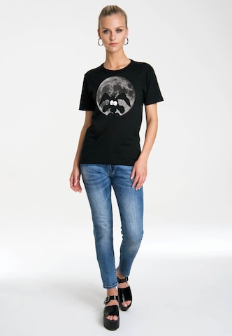 LOGOSHIRT Shirt 'Looney Tunes - Coyote Mond' in Zwart