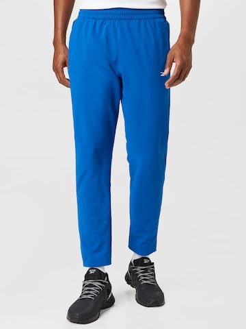 Reebok Обычный Спортивные штаны в Синий: спереди