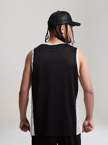 AND1 - Camiseta '93 Airtex' en negro