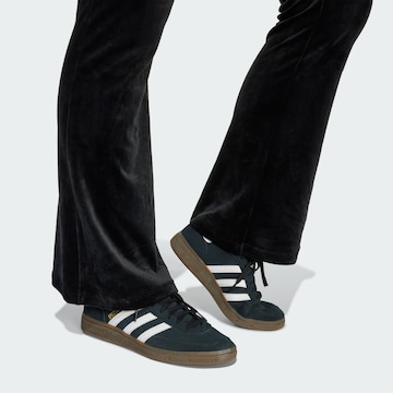 ADIDAS ORIGINALS Flared Trousers in Black