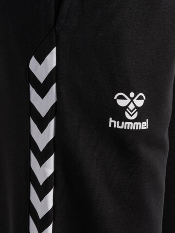 Effilé Pantalon de sport 'Staltic' Hummel en noir