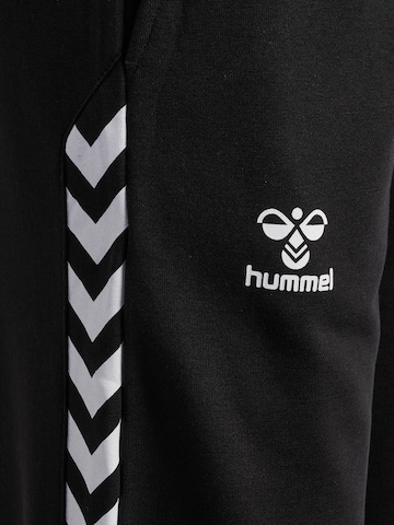 Hummel Дънки Tapered Leg Спортен панталон 'Staltic' в черно