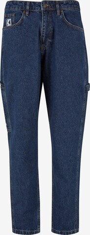 Karl Kani Tapered Jeans in Blue: front