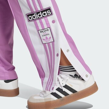 ADIDAS ORIGINALS Loosefit Housut 'Adibreak' värissä lila