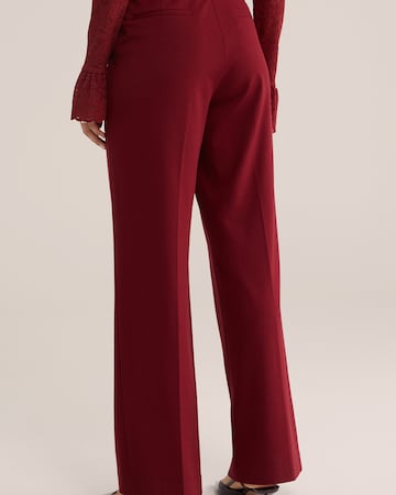 WE Fashion - Perna larga Calças com vincos em vermelho