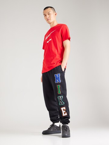 T-Shirt 'SWOOSH' Nike Sportswear en rouge