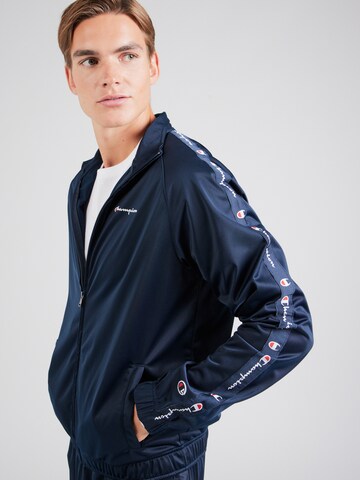 Champion Authentic Athletic Apparel Trainingspak in Blauw