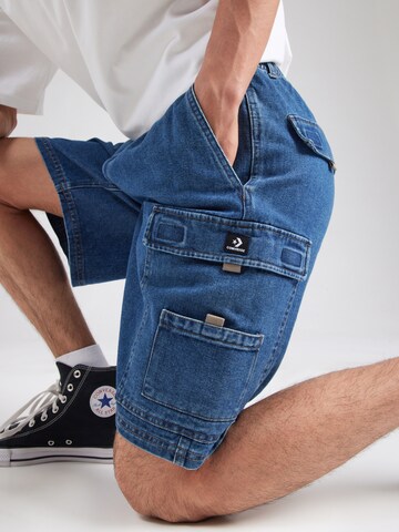 CONVERSE Широка кройка Карго дънки в синьо