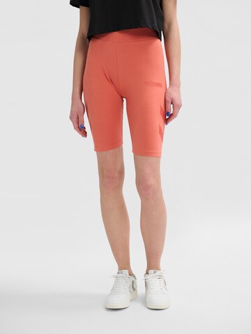 Skinny Pantalon de sport Hummel en orange : devant