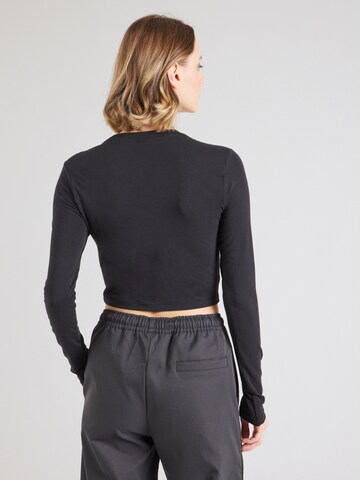 T-shirt 'Chill' Nike Sportswear en noir