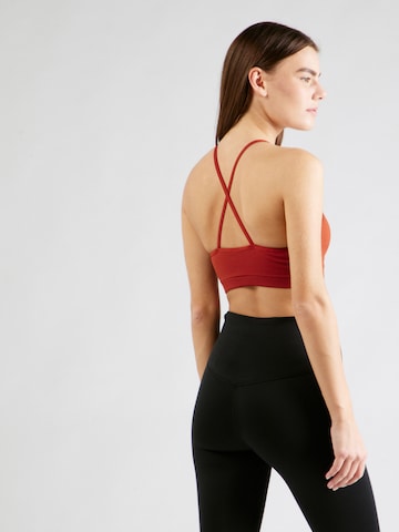 NIKE - Soutien Bustier Soutien de desporto em laranja