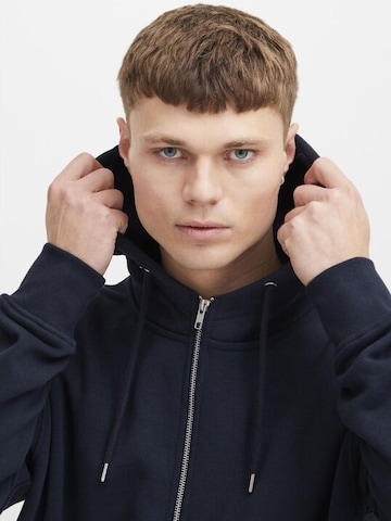 Veste de survêtement !Solid en bleu