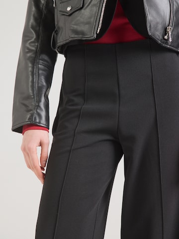 ABOUT YOU Loosefit Ráncos nadrág 'Marica' - fekete