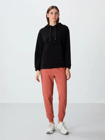 Sweat-shirt Tommy Life en noir