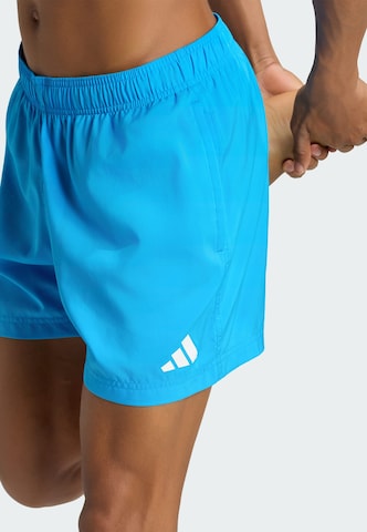 ADIDAS SPORTSWEAR - Calções de banho desportivos em azul