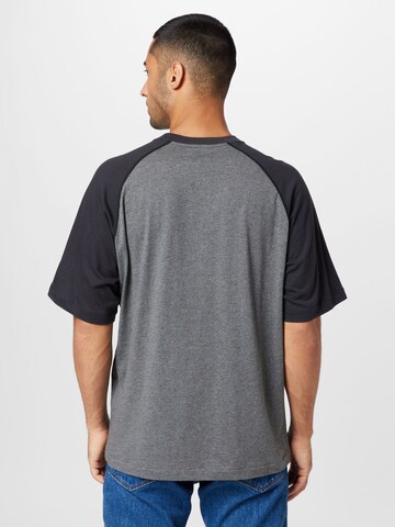 Champion Authentic Athletic Apparel T-Shirt 'Legacy' in Grau