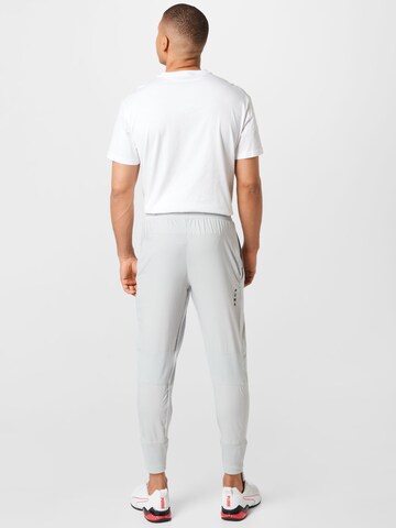 Tapered Pantaloni sport 'Studio' de la PUMA pe gri