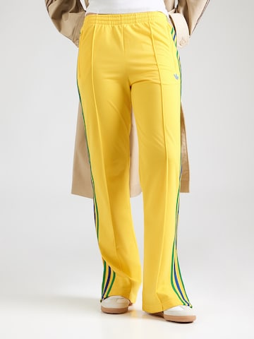 ADIDAS ORIGINALS Свободный крой Штаны 'FB CLASSIC' в Желтый: спереди