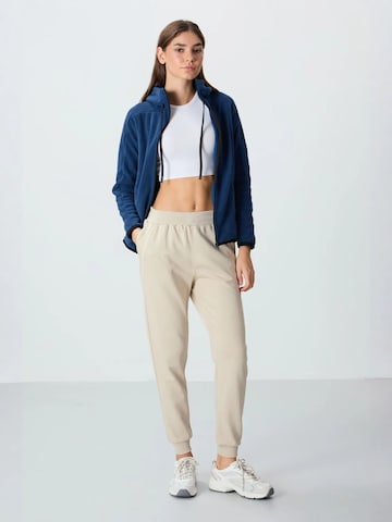 Tommy Life Sports trousers in Mixed colours: front