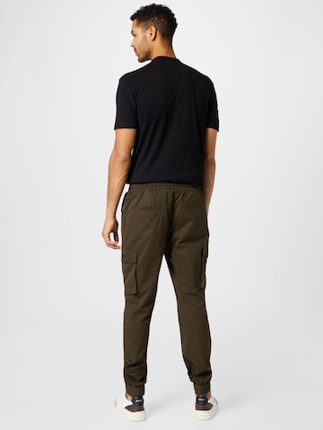 Tapered Pantaloni cu buzunare de la Mennace pe verde