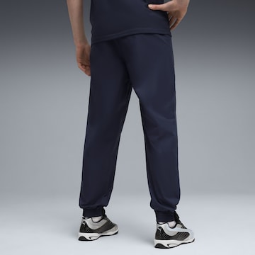 PUMA Slimfit Sportbroek 'Österreich PumaTech' in Blauw