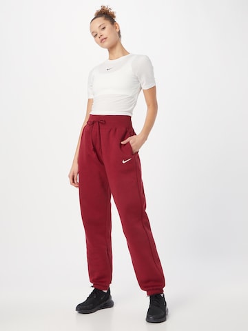 Nike Sportswear Tapered Trousers 'Phoenix Fleece' in Red