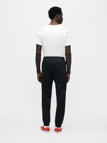 Effilé Pantalon 'RETRO TRACK' CONVERSE en noir